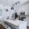 a kitchen with white cabinets
